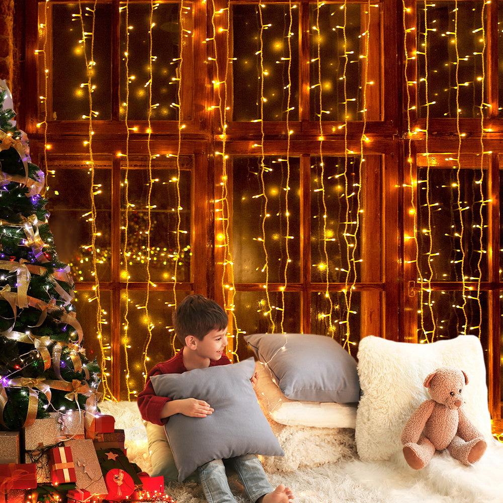 Jingle Jollys 6X3M Christmas Curtain Lights 600LED Warm White Occasions > Lights